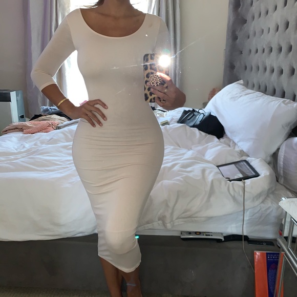 Skin tight and form fitting midi dress - Picture 1 of 6